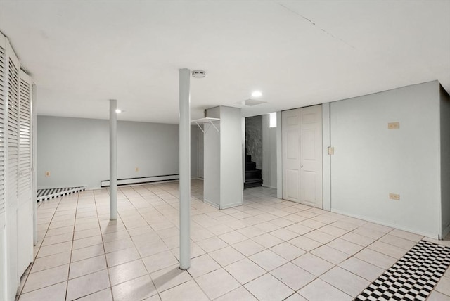 18 Newhall St, Malden, MA 02148 - finished basement featuring baseboard heating, light tile patterned floors, stairs, and recessed lighting