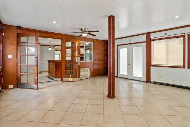 18 Newhall St, Malden, MA 02148 - unfurnished living room featuring french doors, ceiling fan, wood walls, light tile patterned floors, and recessed lighting
