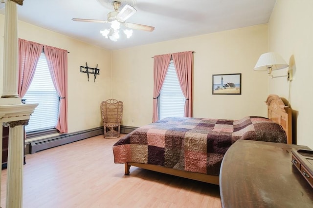 bedroom featuring wood finished floors and ceiling fan