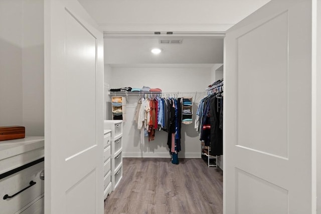 25 Conant St Unit 1, Danvers, MA 01923 - walk in closet featuring wood finished floors