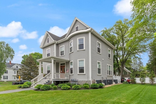 25 Conant St Unit 1, Danvers, MA 01923 - victorian-style house with a porch and a front yard