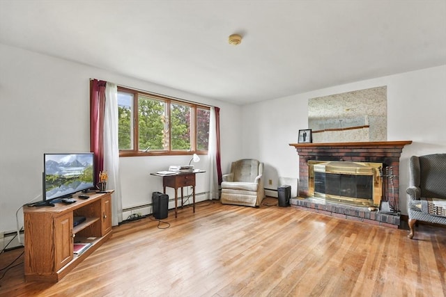 40 Winslow Rd, Quincy, MA 02171 - living room featuring wood finished floors and a brick fireplace
