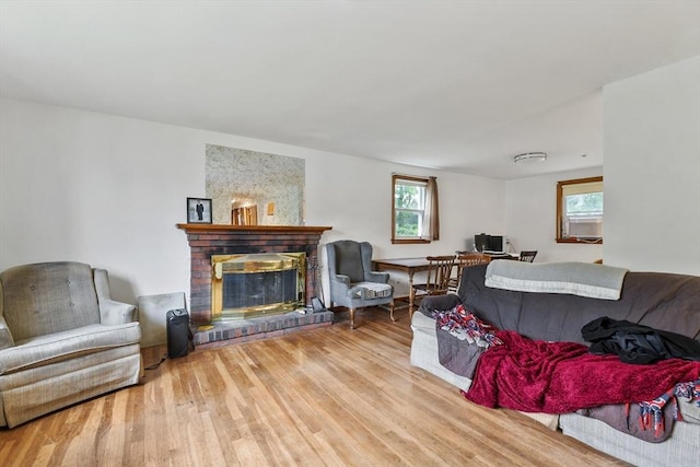 40 Winslow Rd, Quincy, MA 02171 - living room with plenty of natural light, wood finished floors, and a fireplace