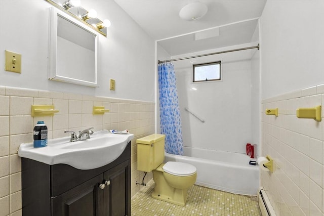 40 Winslow Rd, Quincy, MA 02171 - bathroom with tile walls, vanity, tile patterned floors, a wainscoted wall, and shower / bath combo