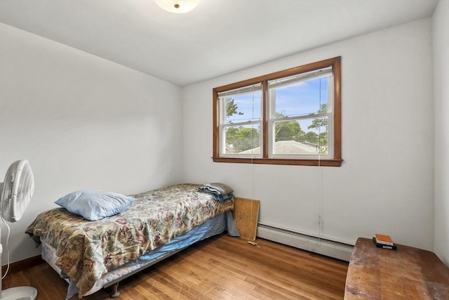 40 Winslow Rd, Quincy, MA 02171 - bedroom with a baseboard radiator and wood finished floors