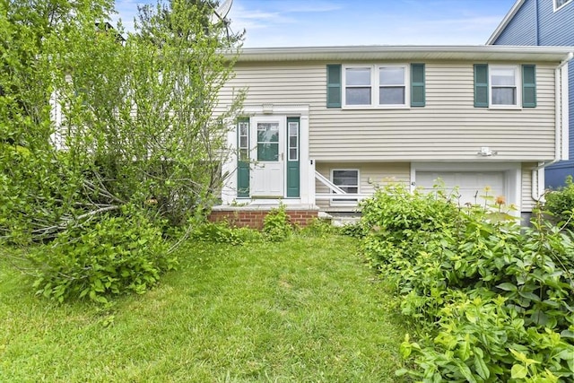 40 Winslow Rd, Quincy, MA 02171 - view of front of home featuring a front yard and a garage
