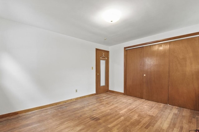 40 Winslow Rd, Quincy, MA 02171 - unfurnished bedroom featuring light wood-style floors and a closet