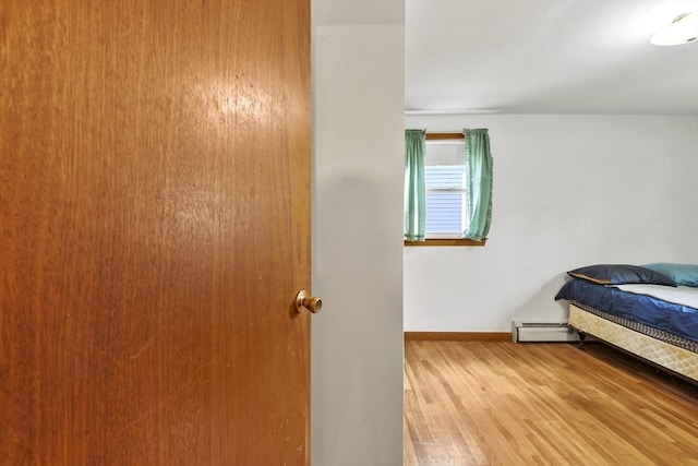 40 Winslow Rd, Quincy, MA 02171 - bedroom featuring baseboard heating and wood finished floors