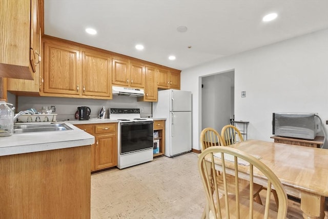 40 Winslow Rd, Quincy, MA 02171 - kitchen with white appliances, under cabinet range hood, light countertops, recessed lighting, and light flooring