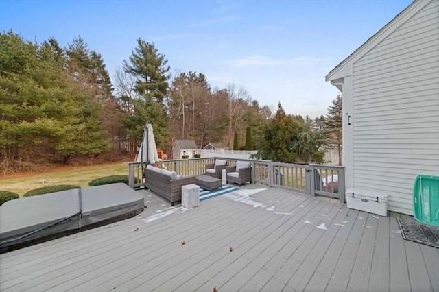 wooden terrace featuring outdoor lounge area