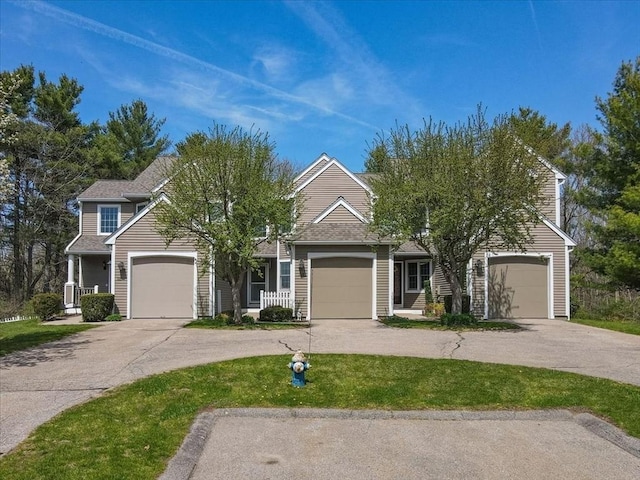 view of front of house with a front yard and driveway