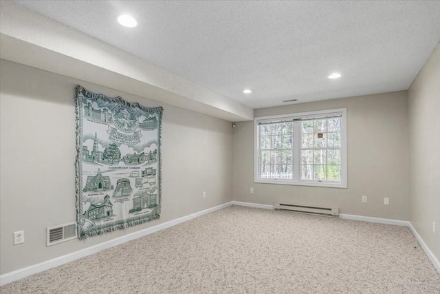 unfurnished room featuring recessed lighting, carpet flooring, visible vents, baseboards, and baseboard heating