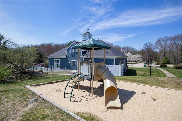 community play area with a yard