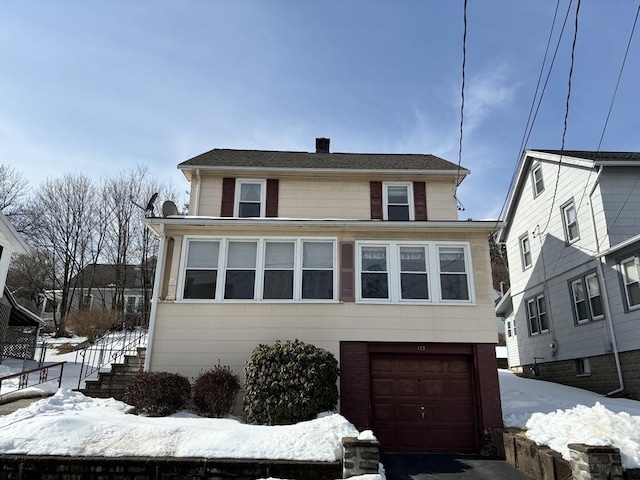 view of front of home featuring a garage