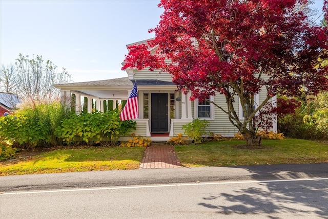 view of front of house with a front lawn