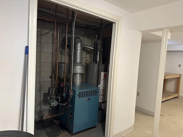 6 Yellow Brick Rd, Haverhill, MA 01835 - utility room with a heating unit and water heater