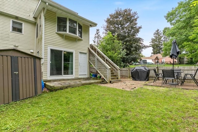30 Taylor St Unit 1, Haverhill, MA 01832 - back of property with a patio and stairs