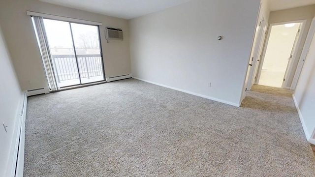10 Williams Unit 39, Watertown, MA 02472 - empty room featuring carpet floors, baseboard heating, and a wall mounted AC