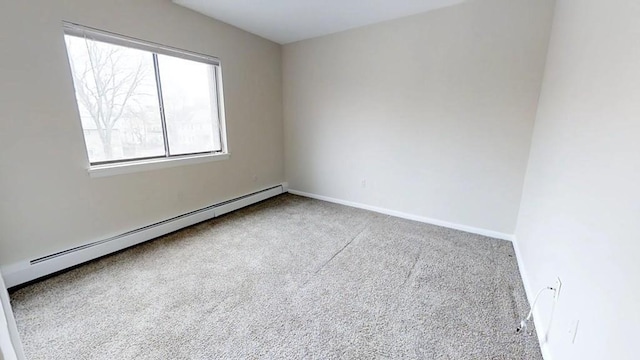 10 Williams Unit 39, Watertown, MA 02472 - empty room featuring a baseboard radiator, carpet flooring, and baseboards