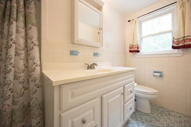286 Mountain St, Sharon, MA 02067 - bathroom with vanity, tile patterned flooring, tile walls, a shower with shower curtain, and wainscoting