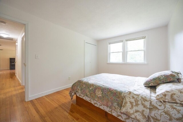 286 Mountain St, Sharon, MA 02067 - bedroom with light wood-style flooring and a closet