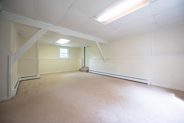 286 Mountain St, Sharon, MA 02067 - basement featuring a baseboard heating unit, carpet flooring, and a drop ceiling