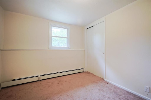 286 Mountain St, Sharon, MA 02067 - unfurnished room featuring light carpet and a baseboard heating unit