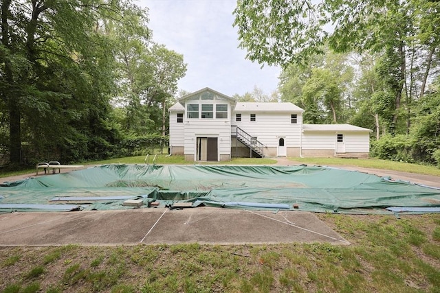 286 Mountain St, Sharon, MA 02067 - view of swimming pool featuring stairway, a covered pool, a lawn, and a patio area