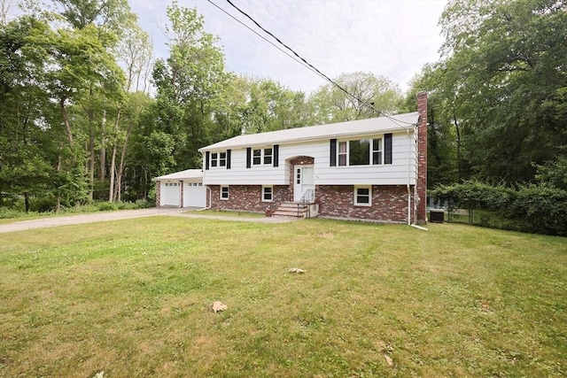 286 Mountain St, Sharon, MA 02067 - split foyer home with brick siding, a chimney, and a front yard