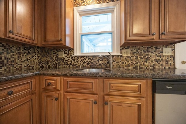 286 Mountain St, Sharon, MA 02067 - kitchen with dishwasher, brown cabinets, backsplash, and dark stone counters