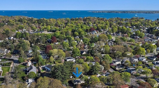 bird's eye view featuring a water view and a residential view
