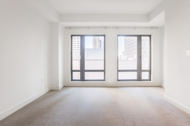 unfurnished room with a wealth of natural light