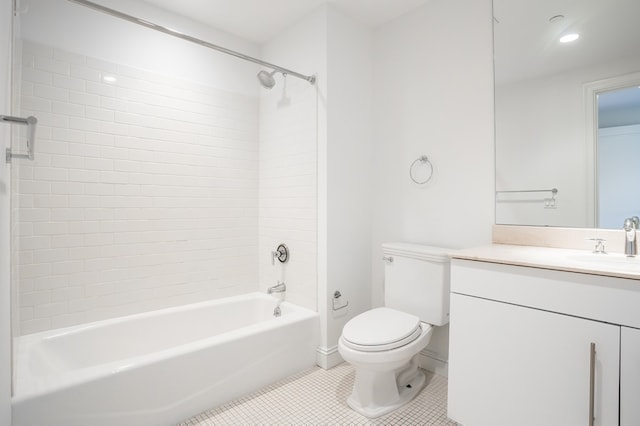 full bathroom with tile patterned flooring, vanity, toilet, and tiled shower / bath