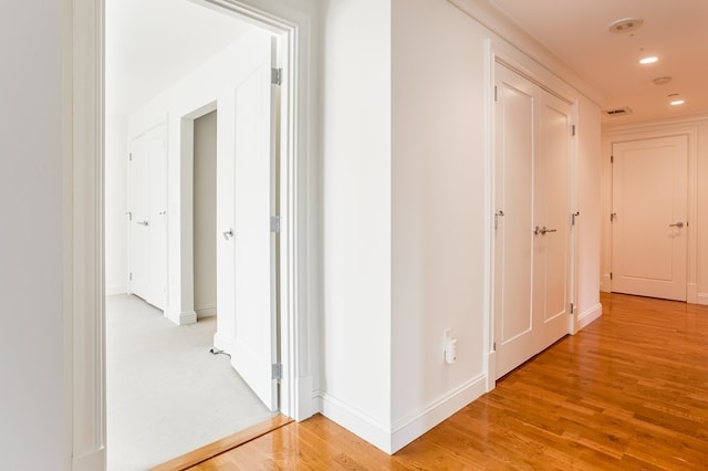 corridor featuring light wood-type flooring