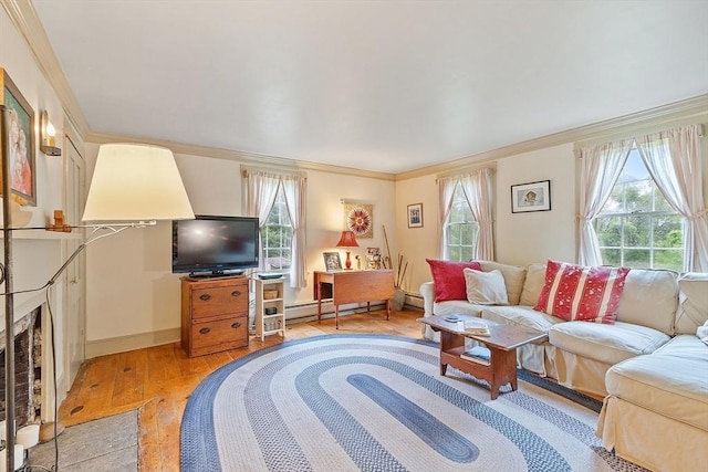 34 Fletcher Ln, Littleton, MA 01460 - living room with light wood finished floors, ornamental molding, plenty of natural light, a baseboard heating unit, and baseboards