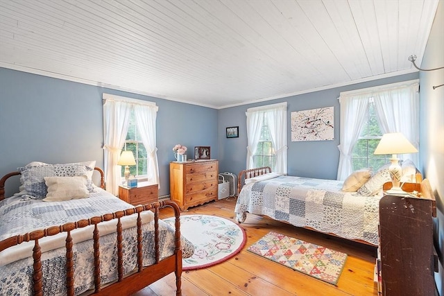 34 Fletcher Ln, Littleton, MA 01460 - bedroom with crown molding, multiple windows, hardwood / wood-style flooring, and wood ceiling