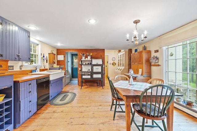 34 Fletcher Ln, Littleton, MA 01460 - dining area with light wood finished floors, a chandelier, a baseboard heating unit, and recessed lighting