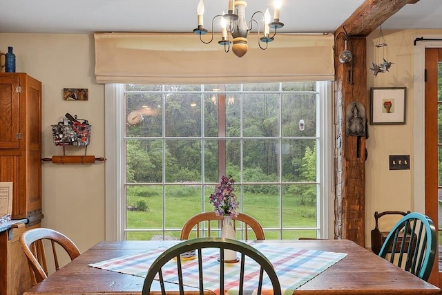 34 Fletcher Ln, Littleton, MA 01460 - dining space with a chandelier and plenty of natural light