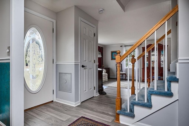 entrance foyer with hardwood / wood-style floors