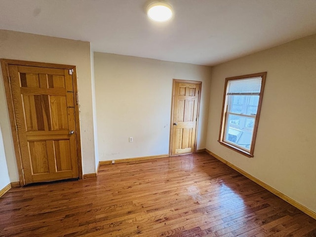 27 Shelby St, Worcester, MA 01605 - unfurnished room with wood finished floors and baseboards