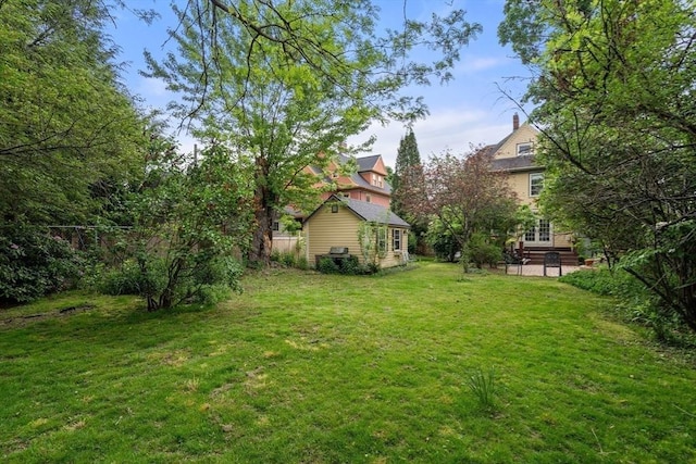 view of yard featuring a patio area and fence