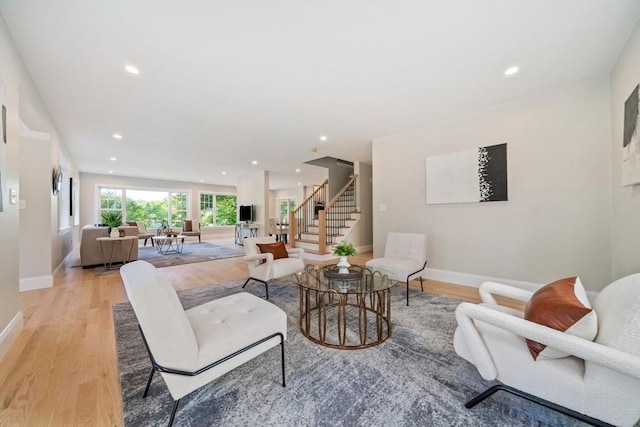 43 Lake Ave, Sharon, MA 02067 - living area featuring stairs, light wood finished floors, and recessed lighting