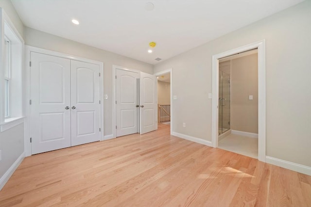 43 Lake Ave, Sharon, MA 02067 - unfurnished bedroom featuring light wood-style flooring, recessed lighting, and a closet