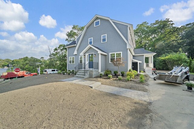 43 Lake Ave, Sharon, MA 02067 - dutch colonial with a gambrel roof, driveway, and a shingled roof