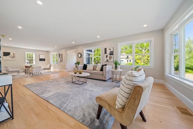 43 Lake Ave, Sharon, MA 02067 - living area with recessed lighting and light wood-style floors