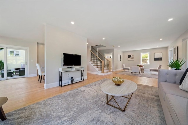 43 Lake Ave, Sharon, MA 02067 - living room featuring stairway, light wood-style floors, and recessed lighting