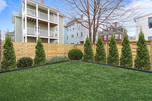 view of yard featuring fence