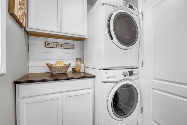 261 Bean Porridge Hill Rd, Westminster, MA 01473 - laundry room with cabinet space and stacked washer / dryer