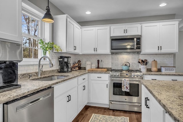 261 Bean Porridge Hill Rd, Westminster, MA 01473 - kitchen with dark wood-type flooring, white cabinetry, a sink, and stainless steel appliances