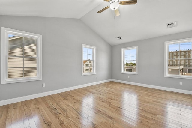 119 Tripp St, Fall River, MA 02724 - unfurnished room with light wood-style flooring, lofted ceiling, plenty of natural light, and a ceiling fan